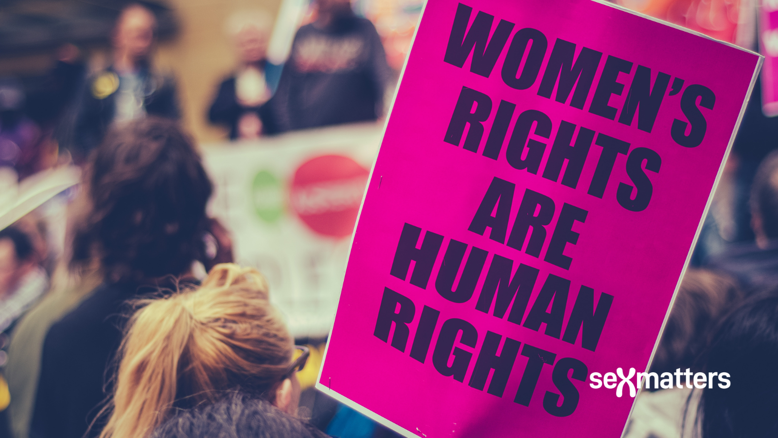 Freedom of speech – banner saying "Women's rights are human rights"