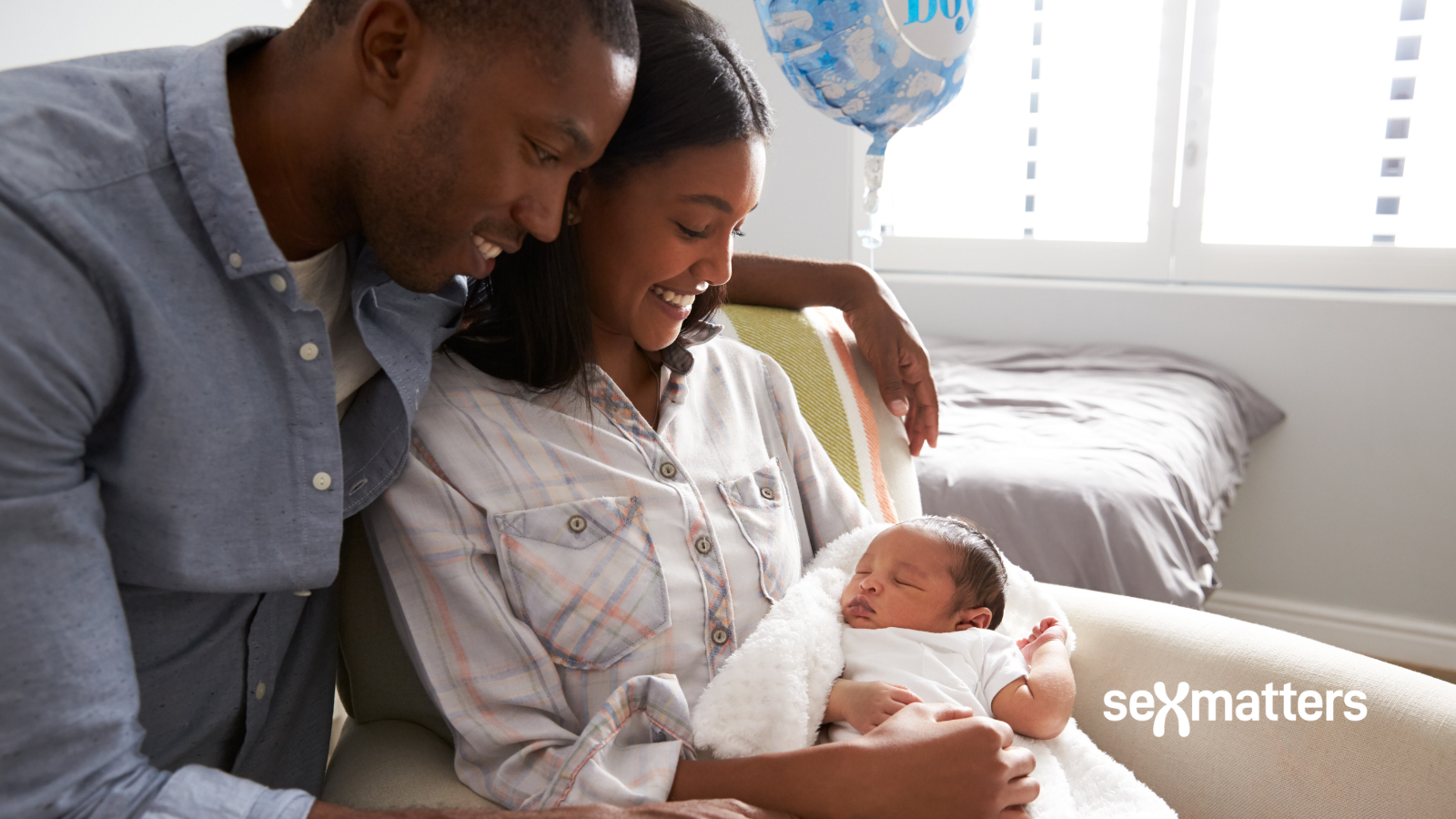 Relationships – a man and woman with a baby