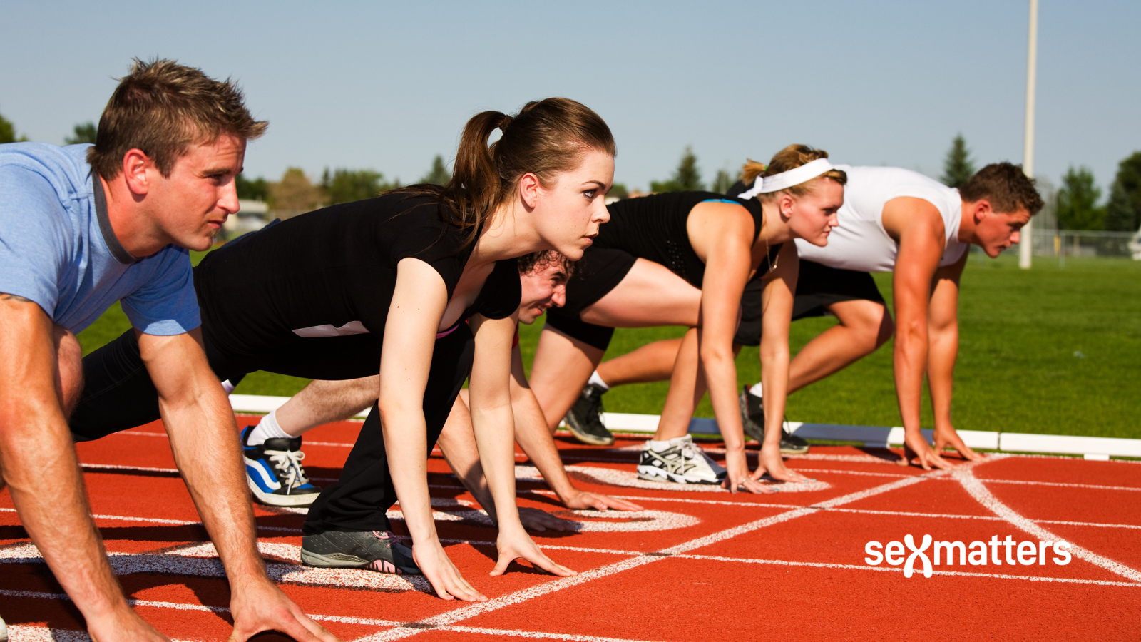 Sport – men lining up with women at the start of a race