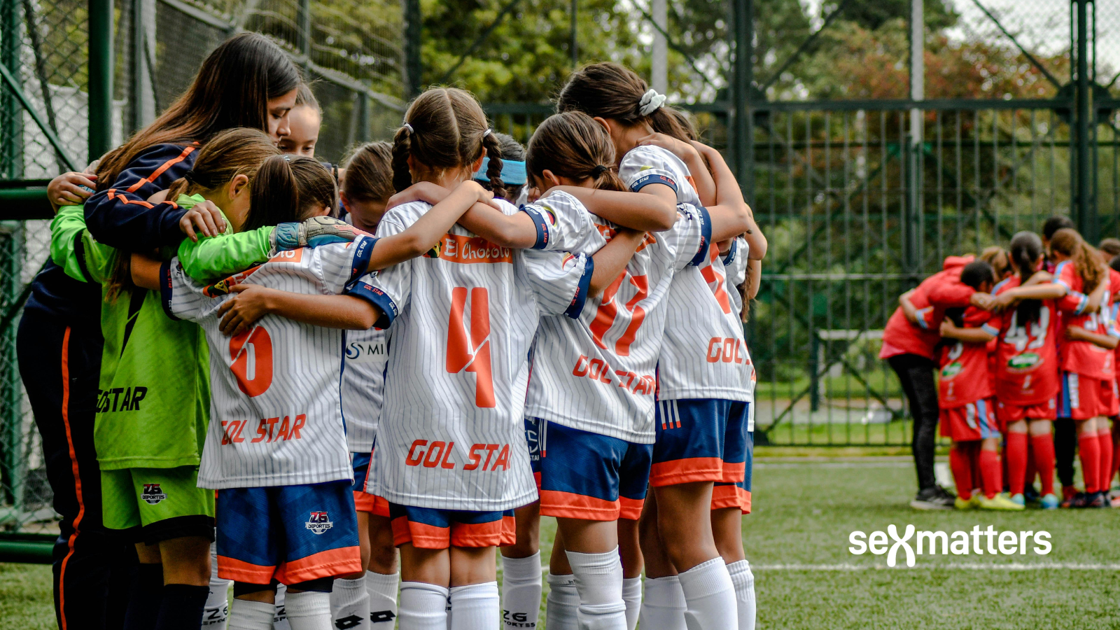 girls playing football